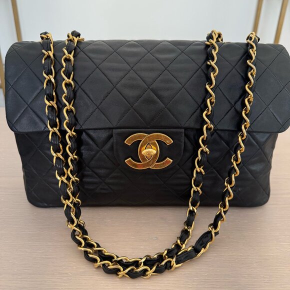 CHANEL Handbags - Chanel Vintage Black Jumbo Classic Flap Bag 24k Gold Hardware Lambskin Leather